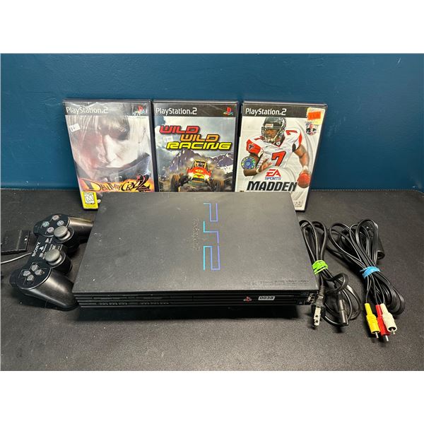 Lot of 1 Sony Playstation 2 Console - Complete with Games!