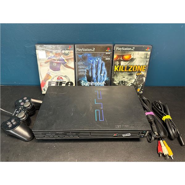 Lot of 1 Sony Playstation 2 Console - Complete with Games!