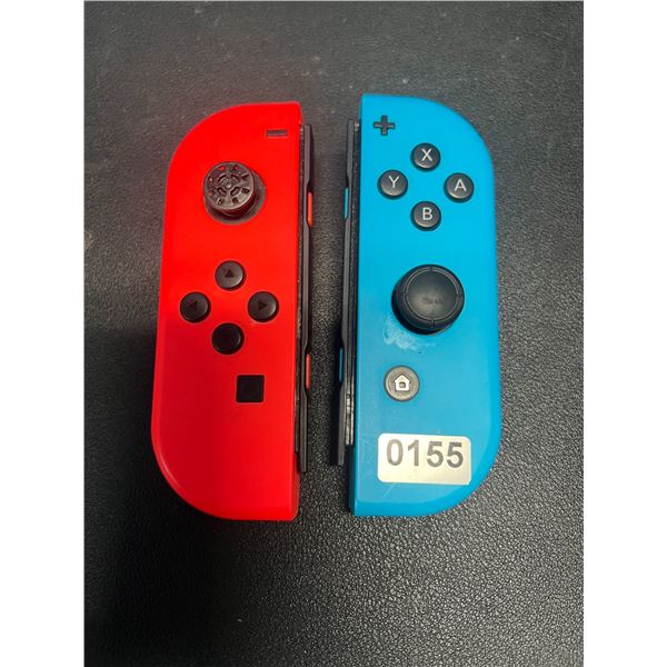 Lot of 1 Pair of Nintendo Switch Official Nintendo Joy Cons - USED
