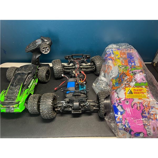 Lot of 2 RC Cars and New Shell - USED