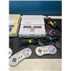 Image 3 : Lot of 2 Super Nintendo Entertainment Systems w/ 2 Games, Cords & Controllers - Used/As Is