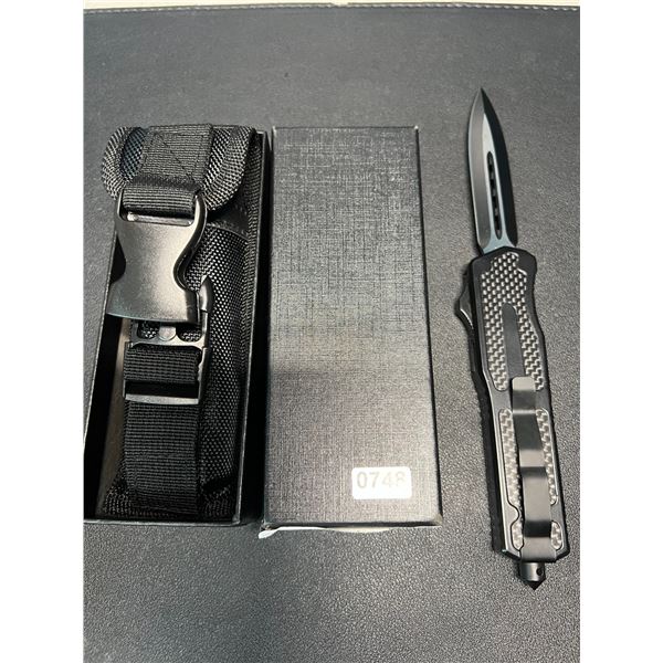 Lot of 1 Out-The-Front Carbon Fiber Pop-Out Knife