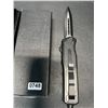Image 2 : Lot of 1 Out-The-Front Carbon Fiber Pop-Out Knife