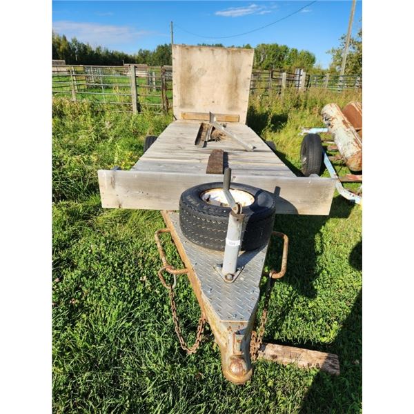 trailer with wooden deck fold down ramp