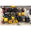 Image 1 : Large group of assorted batteries and battery chargers for tools