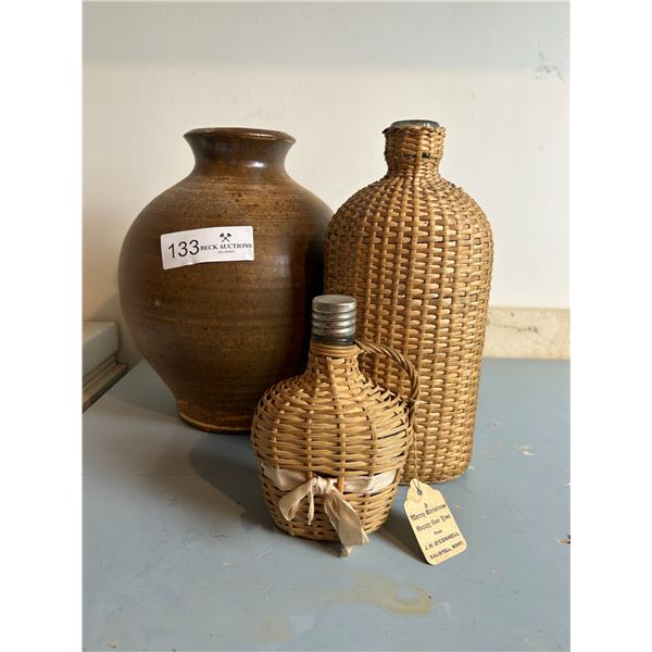 Ceramic Vase And Decorative Glass Bottles Wrapped In Wood