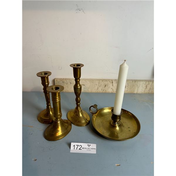 Assortment Of Brass Candle Holders Of Various Sizes