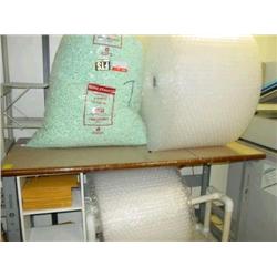 LOT - TABLE W/ PACKAGING SUPPLIES