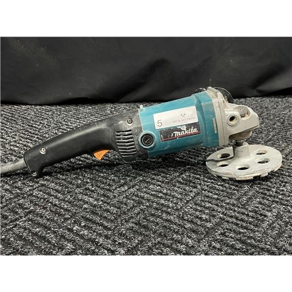 Makita Grinder With 5 inch Diamond Grinding Wheel