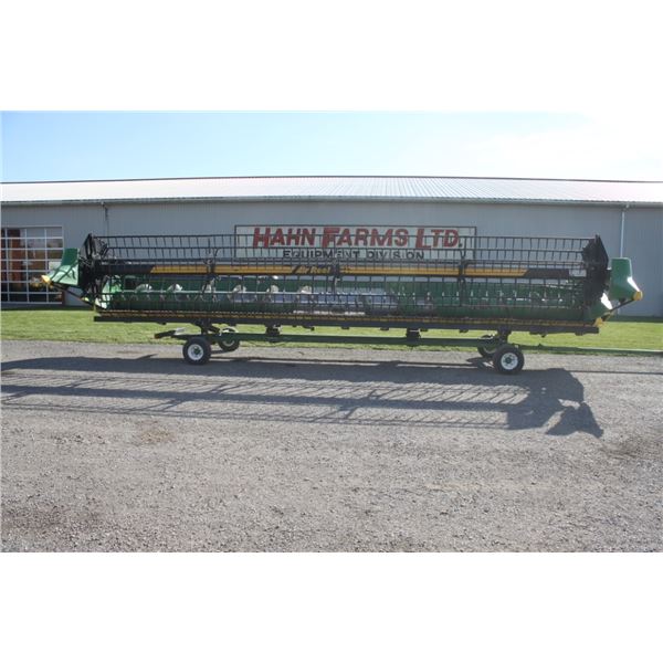 JD 630F flexhead, Schumacher knife, poly floor, Crary air reel, complete with cab mounted blower