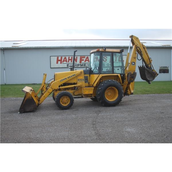 JD 410B 4wd backhoe, cab, extendahoe, 19.5x24, 5352 hours