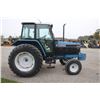 Image 5 : Ford 7740 SLE 2wd tractor, cab, air, 2 remotes, powershift, 18.4x34, 6 front weights, 5162 hoursone