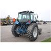Image 6 : Ford 7740 SLE 2wd tractor, cab, air, 2 remotes, powershift, 18.4x34, 6 front weights, 5162 hoursone