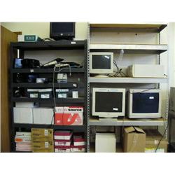 Lot of 2 metal shelves with electric staplers, computer keyboards, computers, monitors