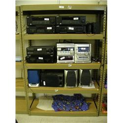 Metal shelf with lot of stereo equipment: Sony, Technics, Phillips: (2) audio/video control centers,