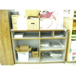 Wood laminate counter with assorted office supplies