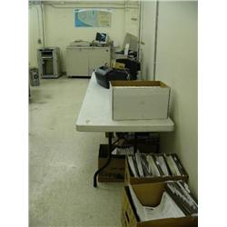 Downstairs past trash cans- Office: Office work station, chair Dell Computers, HP Laser Jet 4 Plus, 