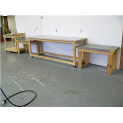 Lot of 4 wooden work tables (2) rolling