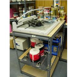 metal shelf with color, rolling cart, & Heidelberg punch