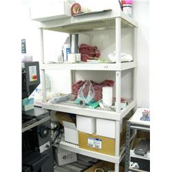 Plastic shelf with rags and fire extinguisher