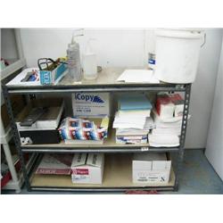 Metal shelf with paper