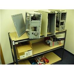 3 wood shelves with computer parts