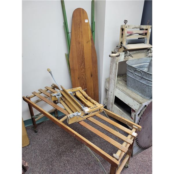 Ironing board with wash stand and wringer
