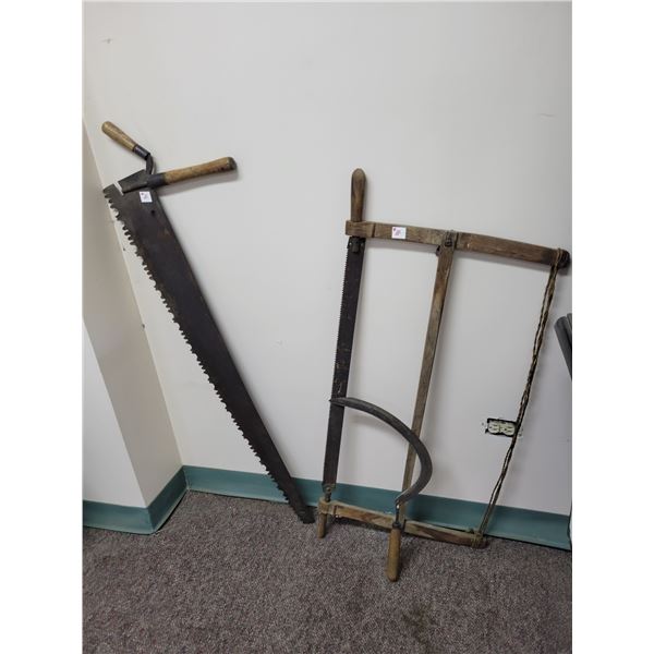 2 saws and hand scythe