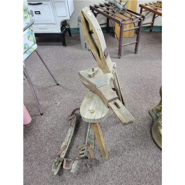 Antique harness bench, old pack saddle and curry comb