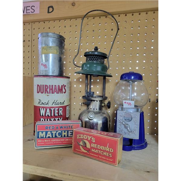 old cans ,match boxes (no matches), lantern, gum ball machine