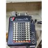 Image 1 : corona adding machine
