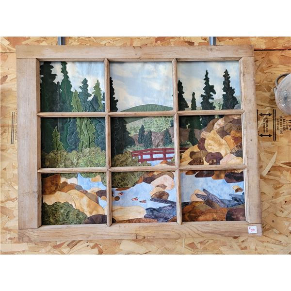 beautiful quilted picture with old wooden window frame