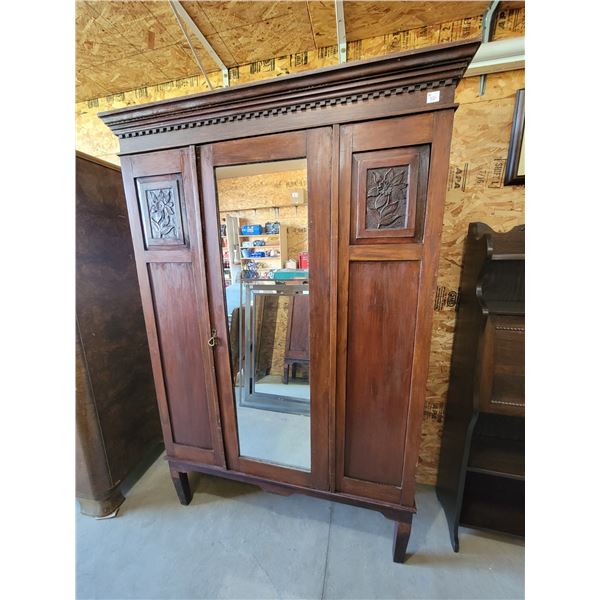 wooden wardrobe with carvings