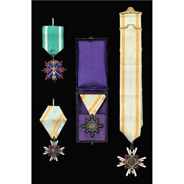 4 WWII JAPANESE MEDALS.
