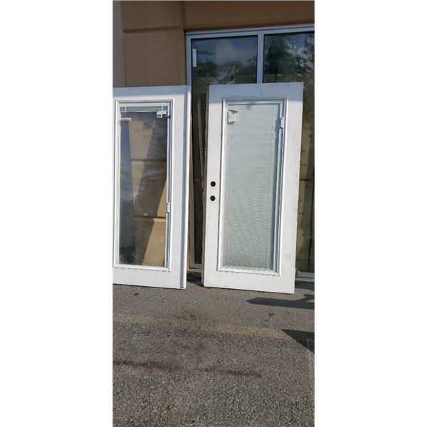 2 EXTERIOR PATIO DOORS 32  X 77 