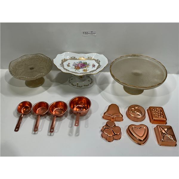 Collection Of Rasied Dessert Plates, Cookie Cutters, And Measuring Cups