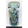 Image 2 : #630 VINTAGE GLASS JAR FULL OF MARBLES