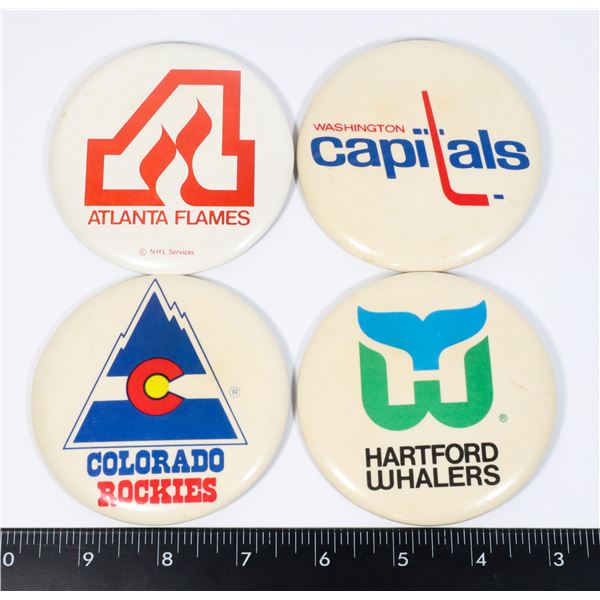 #642 NHL LOT OF 4 LARGE VINTAGE BUTTONS CAPITALS