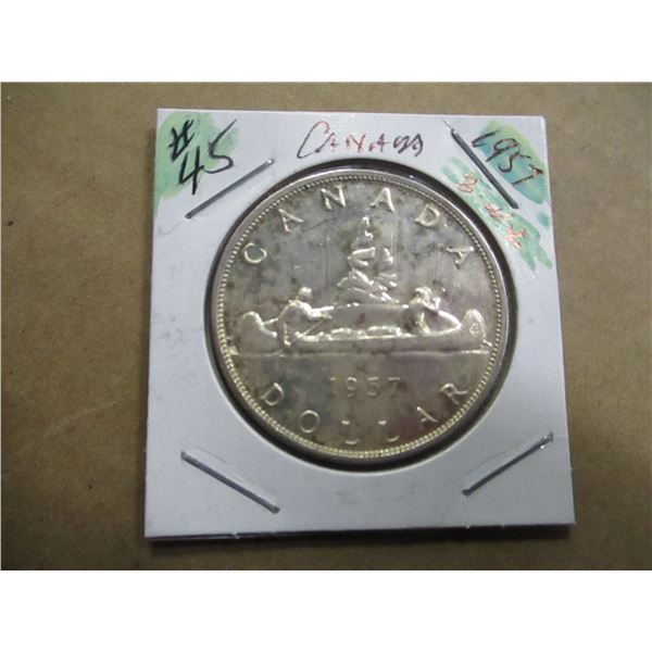 1957 THREE WATERLINE SILVER DOLLAR