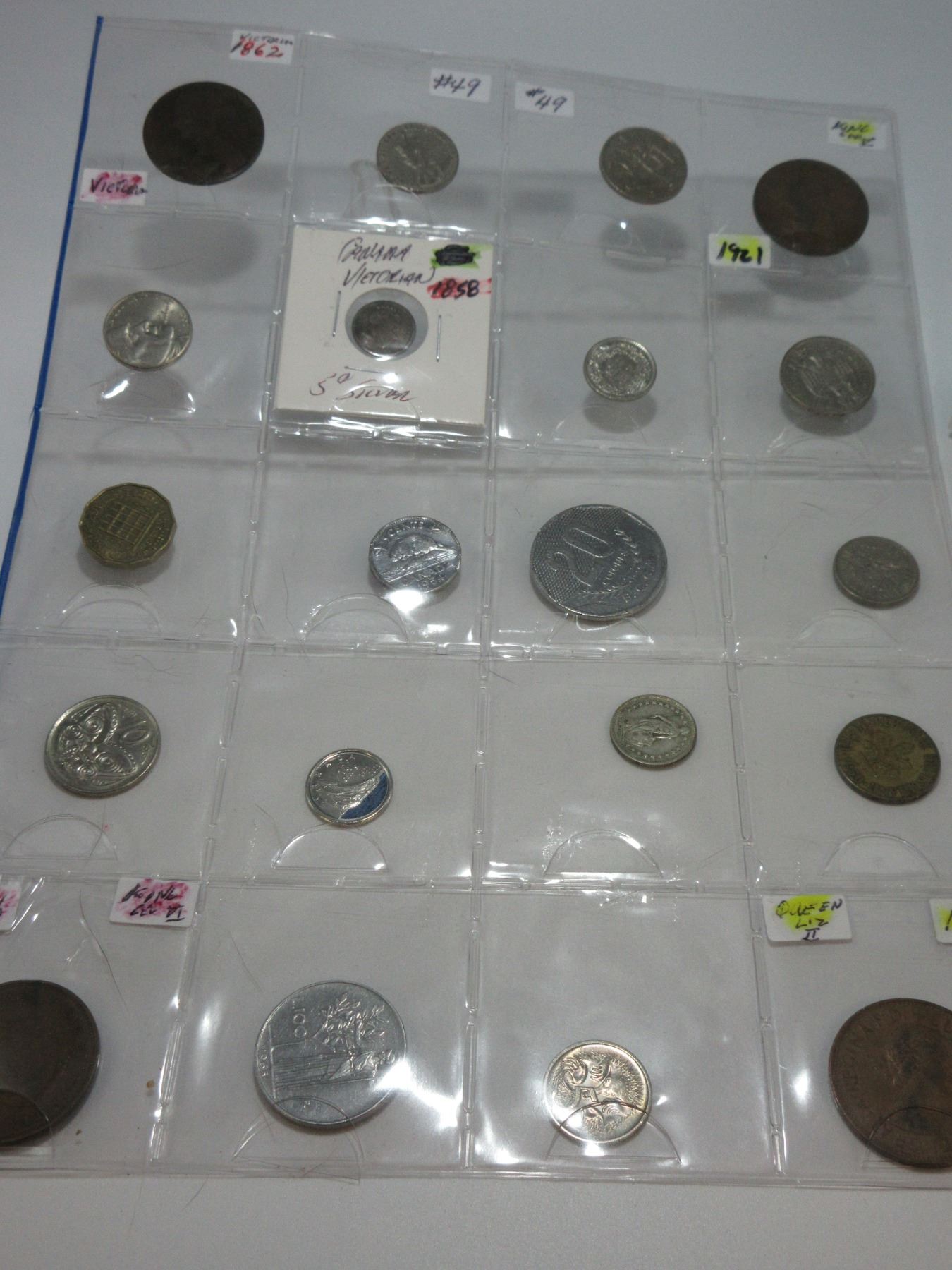 STOCK SHEET OF 20 CANADIAN & WORLD COLLECTIBLE COINS