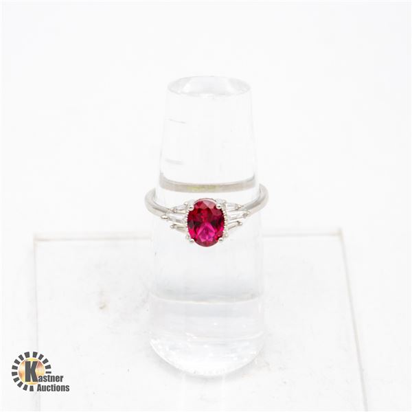 6X8 OVAL RED CUBIC ZIRCONIA WITH 3 GRADUATED BAGUE