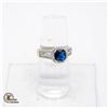 Image 1 : 6.90 MM BLUE CUT STONE SURROUNDED BY HALO