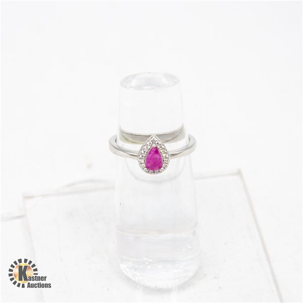 PEAR SHAPED TREATED NATURAL RUBY SURROUNDED BY