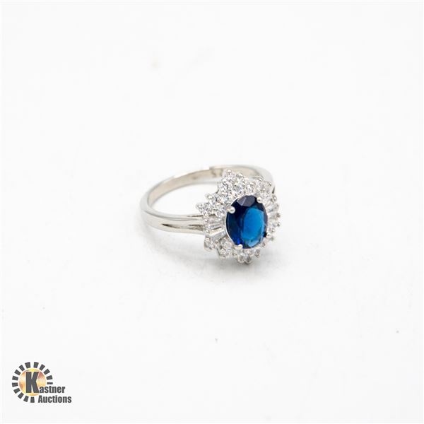 7X9 OVAL BLUE CUBIC ZIRCONIA WITH TAPERED BAGUETTE