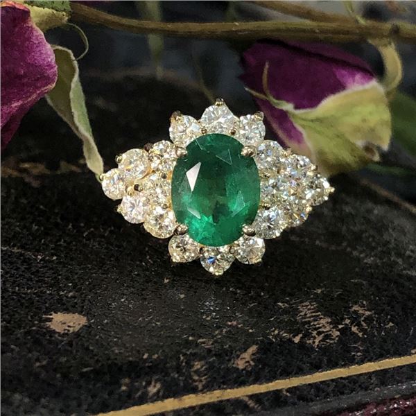 Stunning Emerald and Impressive Diamond Halo Ring