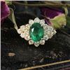 Image 1 : Stunning Emerald and Impressive Diamond Halo Ring