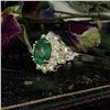 Image 2 : Stunning Emerald and Impressive Diamond Halo Ring