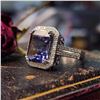 Image 2 : Classically Elegant Iolite and Diamond Halo Ring