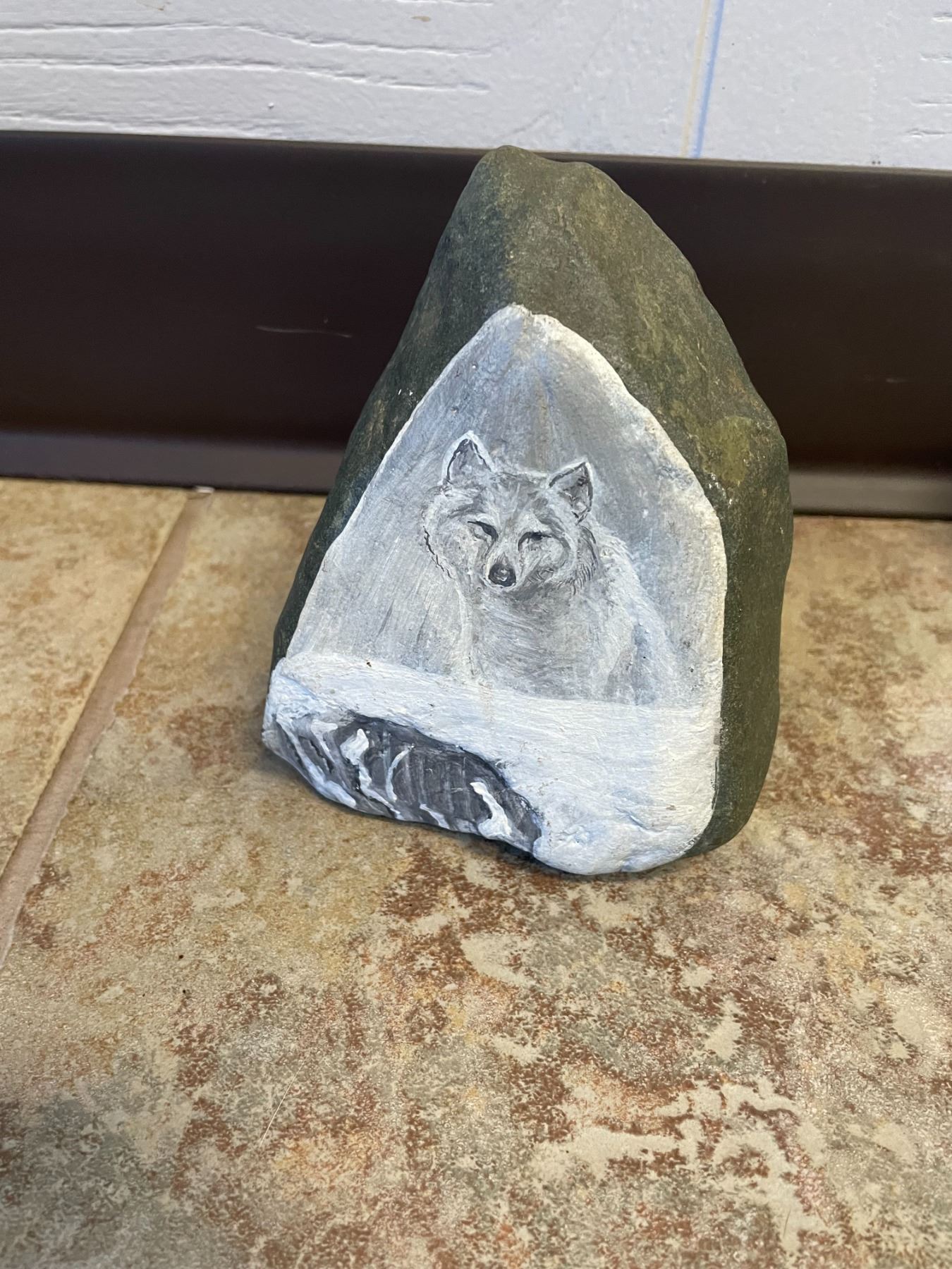 Artwork, painting of wolf on rock