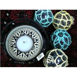 Ships Compass 7" across made in Boston and 4 glass balls with netting (74)